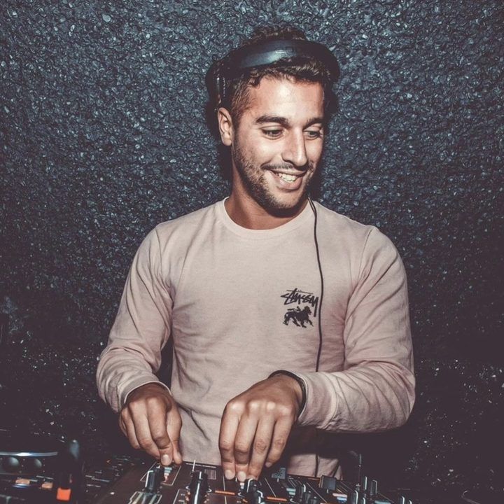 Omar Meho DJing at a mixer